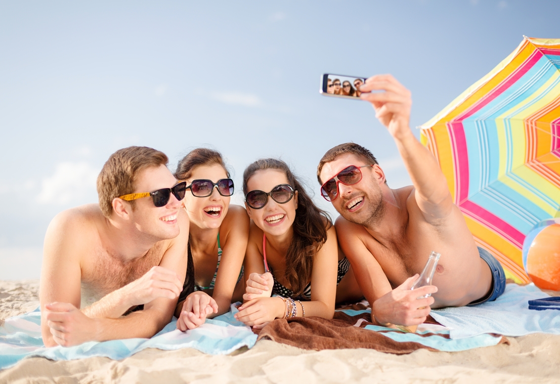 http://www.dreamstime.com/stock-images-group-people-taking-picture-smartphone-summer-holidays-vacation-technology-happiness-concept-smiling-sunglasses-image35777144